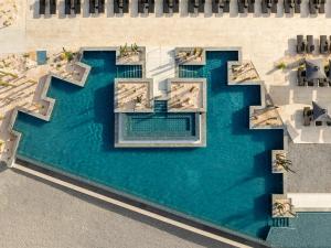 an overhead view of a pool of water at Secrets Baby Beach Aruba Adults Only in Ceru Colorado