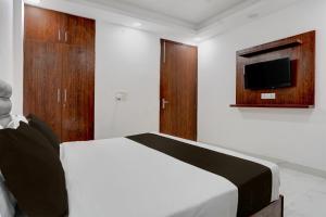 TV a/nebo společenská místnost v ubytování Hotel O Dada Hotel& Restaurant + 23 fotografií