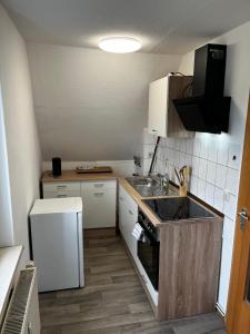 Dapur atau dapur kecil di Gästehaus Engersen - Monteurswohnung