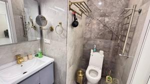 Koupelna v ubytování Boulevard Tashkent City