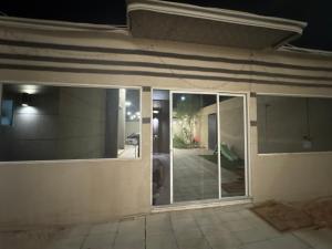 a front door of a house with large glass windows at استراحه و مجلس مدمجه in Riyadh