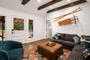 a living room with a couch and a table at Updated Downtown home next to NAU in Flagstaff +19 photos