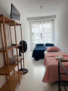 Ένα ή περισσότερα κρεβάτια σε δωμάτιο στο Kit net