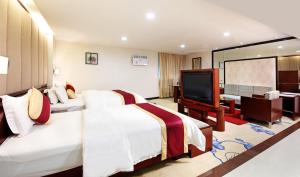 TV o dispositivi per l'intrattenimento presso New World Hotel
