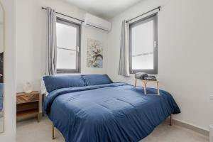 Ένα ή περισσότερα κρεβάτια σε δωμάτιο στο Modern 2 Bed Room Suite in Art District