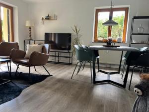 TV a/nebo společenská místnost v ubytování Isar Diamond + 6 fotografií
