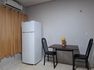 Kuchyň nebo kuchyňský kout v ubytování Quarto no centro de Araguaína com garagem