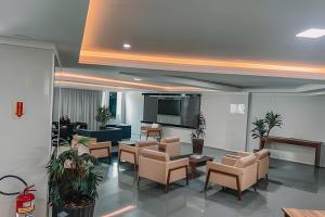 Televisyen dan/atau pusat hiburan di Loft vista panorâmica da Roda gigante e orla de BC