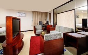 TV o dispositivi per l'intrattenimento presso New World Hotel