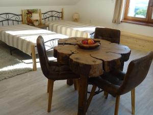 Postel nebo postele na pokoji v ubytování Na půdě