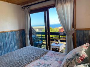 Giường trong phòng chung tại Hostal F
