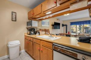 a kitchen with a sink and a counter top at Grandview Condo in Breckenridge