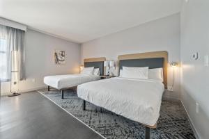 Postel nebo postele na pokoji v ubytování Homewood Suites By Hilton Austin Airport