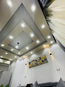 a living room with a coffered ceiling at بورتو سعيد فندق وشقق مميزة in Port Said +50 photos