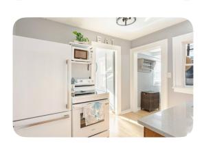 a kitchen with white walls and a counter top at Gated single family home downtown ST Petersburg, FL in St. Petersburg