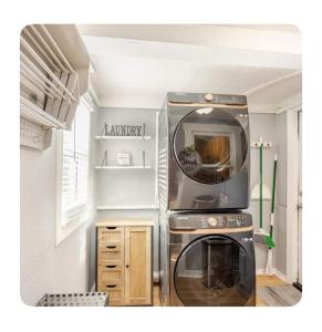 a kitchen with a stove and a microwave at Gated single family home downtown ST Petersburg, FL in St. Petersburg