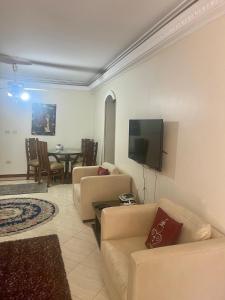 TV a/nebo společenská místnost v ubytování Seaside Apartment In Alexandria