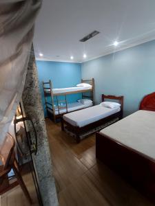 Giường trong phòng chung tại Residence Hostel Efrata