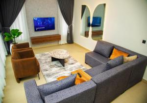 Posezení v ubytování Lekki Central Apartments With Pool