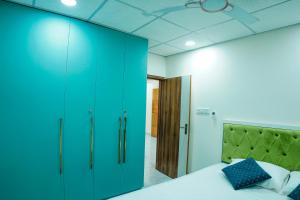 Ένα ή περισσότερα κρεβάτια σε δωμάτιο στο Maneva Comforts