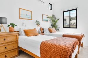 Postel nebo postele na pokoji v ubytování Downtown Casa Conchita Guest Suites + 38 fotografií