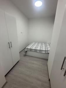 Postel nebo postele na pokoji v ubytování S Apartment's + 3 fotografie