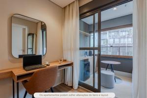 Et tv og/eller underholdning på Radisson Serviced Apartments Jardins Residencial + 31 billeder