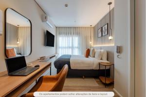 Et tv og/eller underholdning på Radisson Serviced Apartments Jardins Residencial