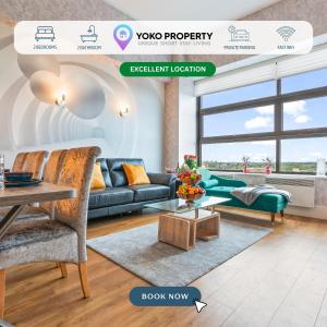 a living room with a couch and a table at Brindley Apartment - City Centre - Free Parking, Fast Wifi and Smart TV by Yoko Property in Birmingham