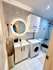 Ένα μπάνιο στο BRAVOMAR Residence