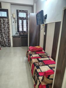 Ένα ή περισσότερα κρεβάτια σε δωμάτιο στο Gopiess +3 φωτογραφίες