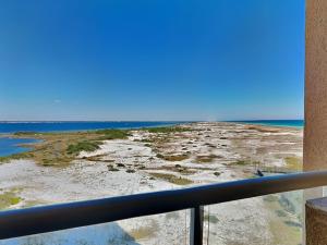 a view of the ocean from a balcony at Portofino Island Resort #2-1002 in Pensacola Beach
