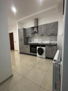 Η κουζίνα ή μικρή κουζίνα στο Roxy's Home in Rome