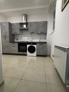 Η κουζίνα ή μικρή κουζίνα στο Roxy's Home in Rome +22 φωτογραφίες