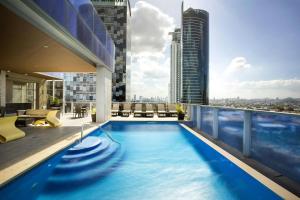 a swimming pool on the roof of a building at The Westin Panama in Panama City