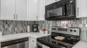 Η κουζίνα ή μικρή κουζίνα στο Waterfront - Family & Pet Friendly for 6 +16 φωτογραφίες