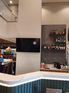 a kitchen with a counter and a counter top at CONFORT iNN EXECUTIVE FARIA LIMA in Sao Paulo