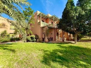 Κήπος έξω από το Les Jardins de la palmeraie