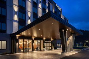 an exterior view of a building at night at Fairfield Inn & Suites by Marriott Chilliwack in Chilliwack
