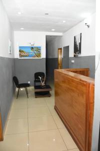 Μια τηλεόραση ή/και κέντρο ψυχαγωγίας στο Serenity Guest House