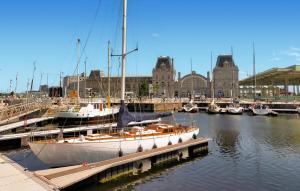 a boat is docked at a dock in a harbor at Luxurious Apartment In Oostende With Wifi in Ostend