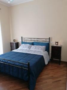 Ένα ή περισσότερα κρεβάτια σε δωμάτιο στο Mavianto