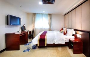 TV o dispositivi per l'intrattenimento presso New World Hotel