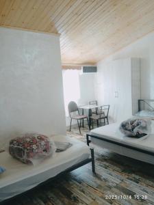 Ένα ή περισσότερα κρεβάτια σε δωμάτιο στο Отель Мечта Кобулети