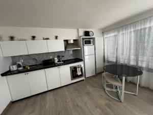 Η κουζίνα ή μικρή κουζίνα στο Phoenix Apartment