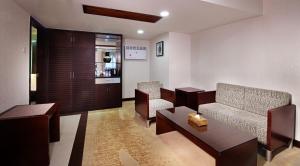 Area soggiorno di New World Hotel