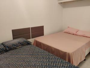 セーハ・ネグラにあるVislumbrante e Aconchegoの部屋に並んで置かれた2つのベッド +22枚の写真