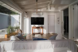 TV/trung tâm giải trí tại Utupia by the sea