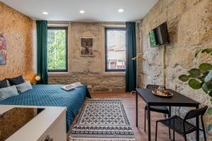 TV a/nebo společenská místnost v ubytování DesKanzo Guest House - Raúl Doria