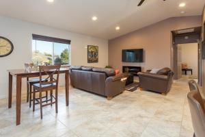 a living room with two couches and a table at Serendipity Retreat - Dogs Welcome Farm Tours and Private Yoga Sessions in Atascadero